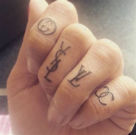 lv finger tattoo
